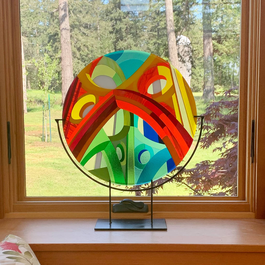 Glass art on display in a customer's home