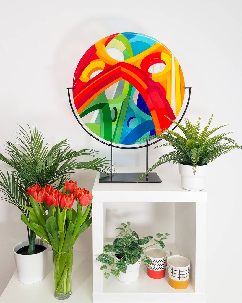 Wells fused glass art roundel in custom-made wrought iron stand
